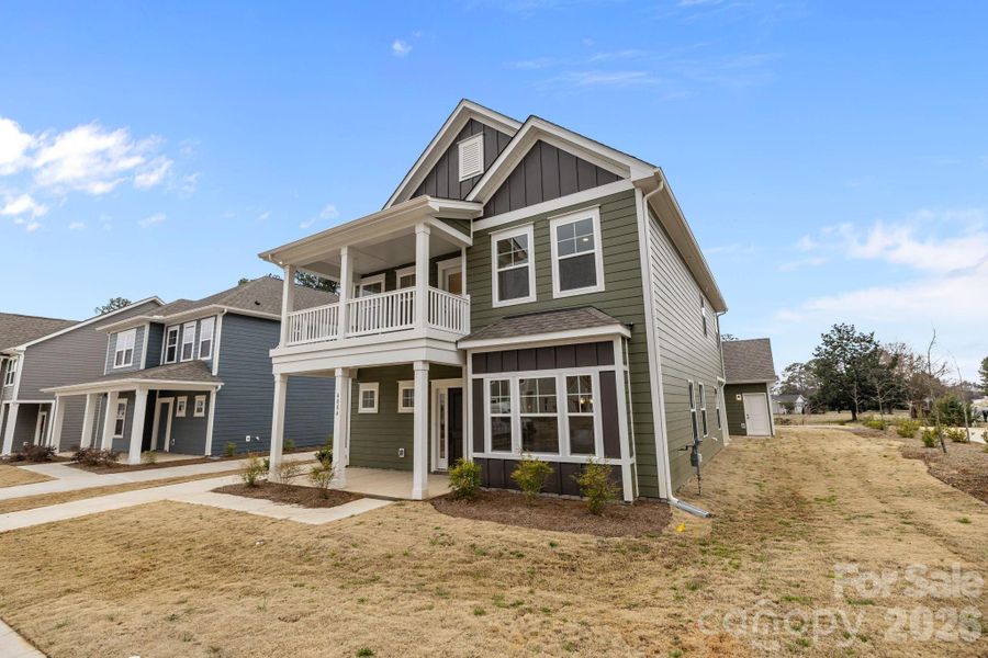 Front exterior of a new home in Arbor Village, Matthews, NC, highlighting curb appeal (Image 16).