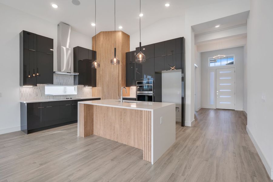 Representative furnished interior of a home built from the Marbella by ABD Development in Hampton Green at Providence, Davenport (Image 6).