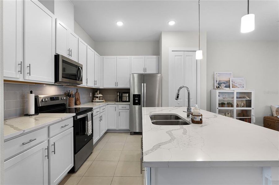 Quartz countertops and subway tile backsplash Quartz countertops and subway tile backsplash