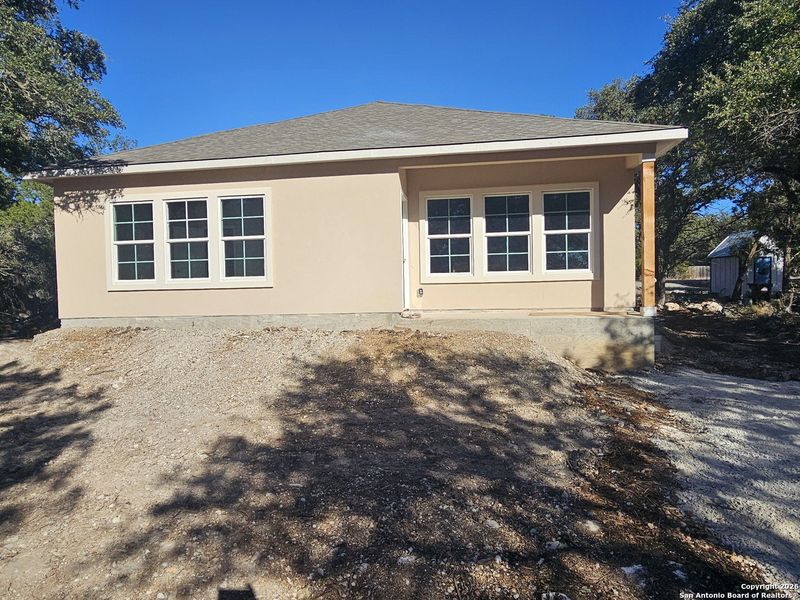 Exterior details and patio area of a home in , Spring Branch (Image 3).