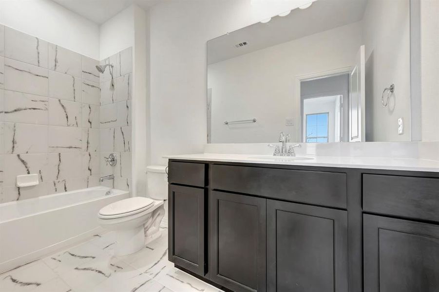 Furnished interior view inside a new home in Lily Creek at Sutton Fields, Aubrey (Image 12).