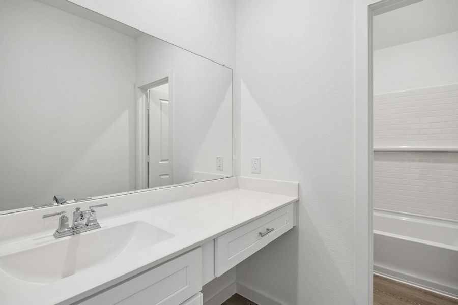 Furnished interior view inside a new home in Ellerden, Tomball (Image 8).