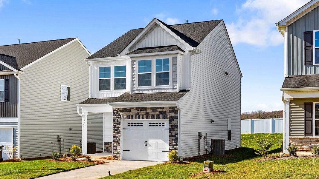 Front exterior of a new home in Hanes Lake, Winston-Salem, NC, highlighting curb appeal (Image 2).