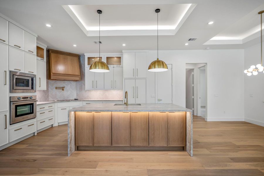 This master piece of a kitchen provides such detail and depth to your everyday cooking experience. All soft close drawers and cabinets with overhead, under cabinet accent lighting and paneled appliances is that extra that all families dream of having. This master piece of a kitchen provides such detail and depth to your everyday cooking experience. All soft close drawers and cabinets with overhead, under cabinet accent lighting and paneled appliances is that extra that all families dream of having.