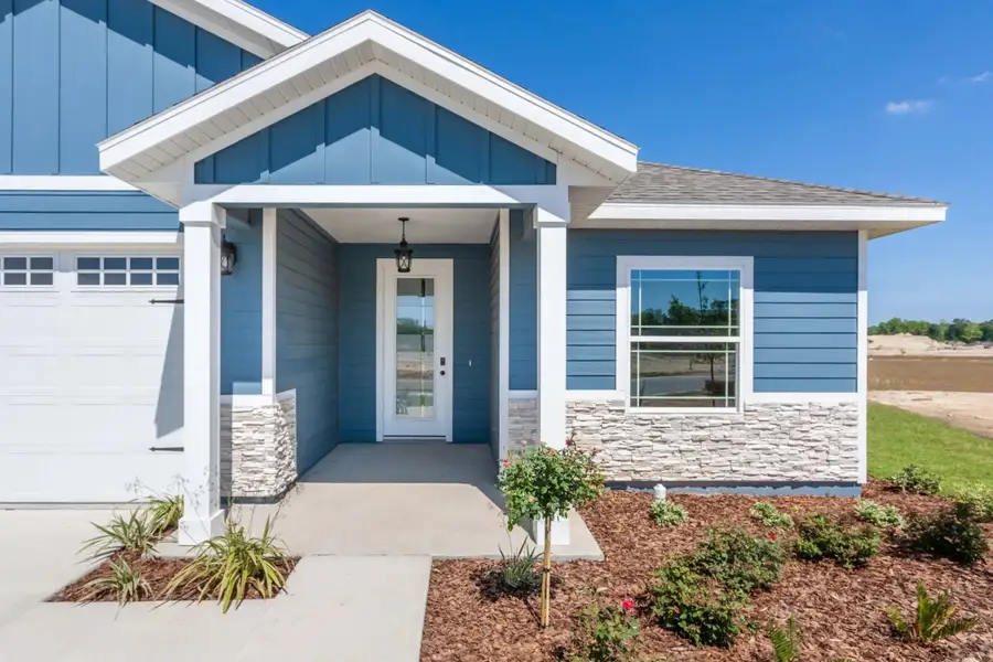 Representative exterior details of a home built from the Pearson by William Weseman Construction in Grand Oaks, Gainesville (Image 2). Representative exterior details of a home built from the Pearson by William Weseman Construction in Grand Oaks, Gainesville (Image 2).