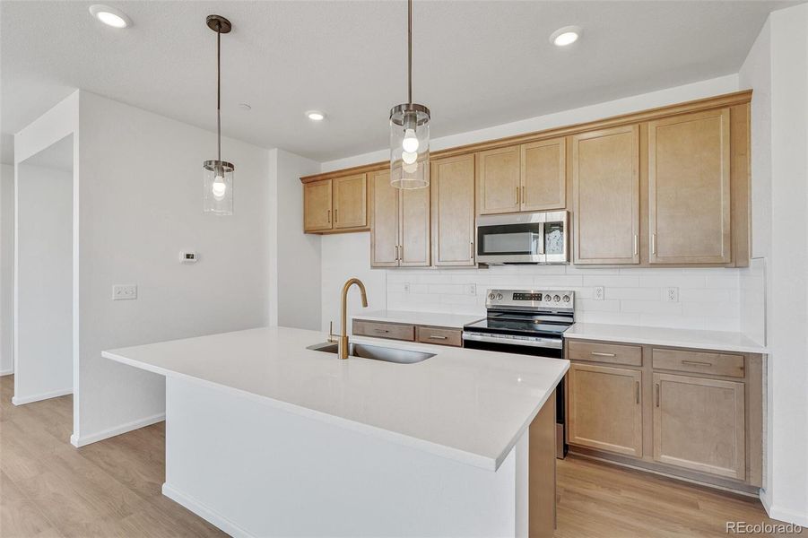 Furnished interior view inside a new home in Turnberry, Commerce City (Image 12).