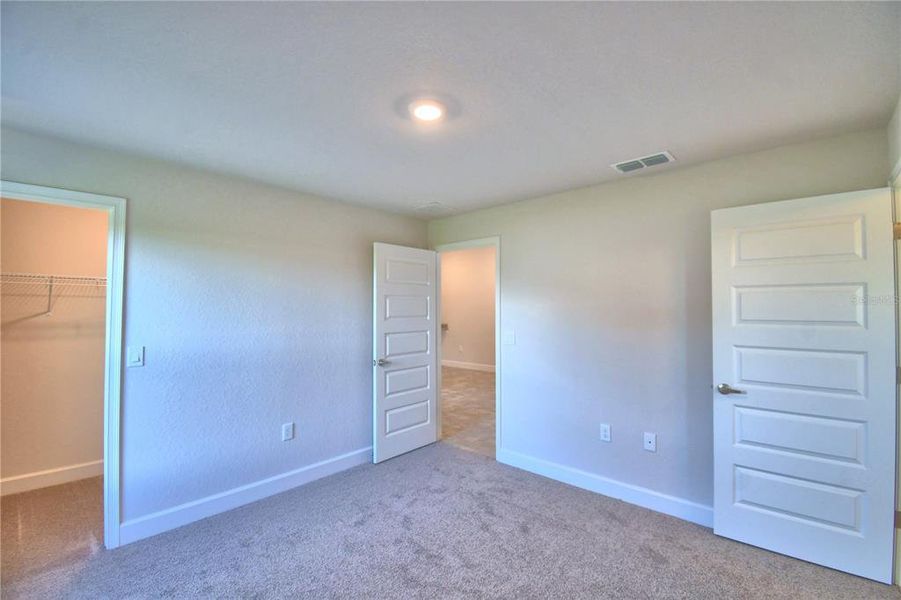 Spacious, unfurnished interior of a new home in Cadence Crossing, Auburndale (Image 48).