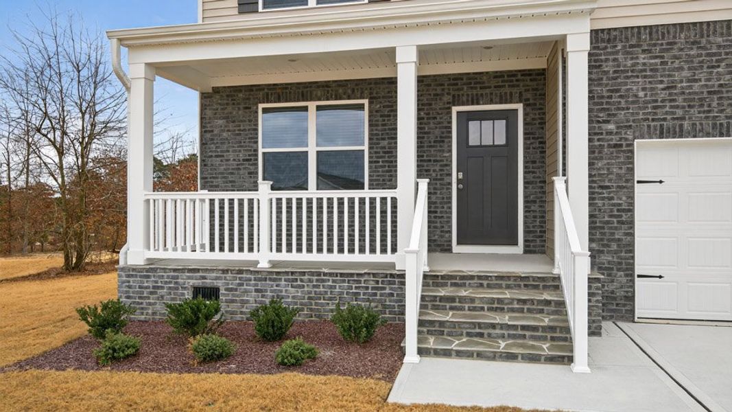Exterior details and patio area of a home in Mason Ridge, Spring Lake (Image 3).