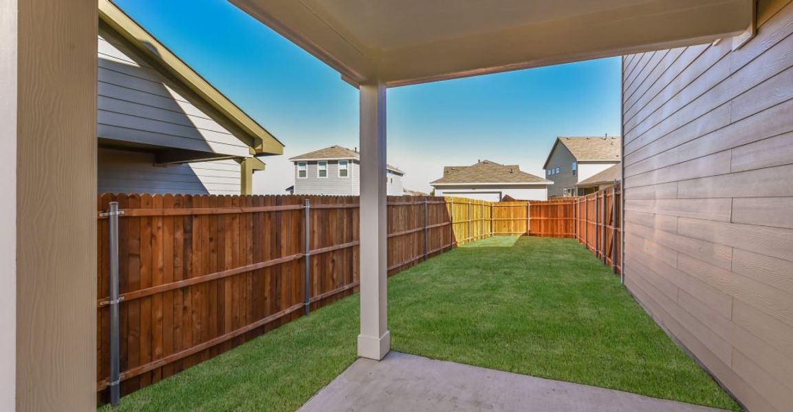 Representative exterior photo of a completed home built from the Adina by Impression Homes in Heartland, Heartland, TX (Image 26). Representative exterior photo of a completed home built from the Adina by Impression Homes in Heartland, Heartland, TX (Image 26).