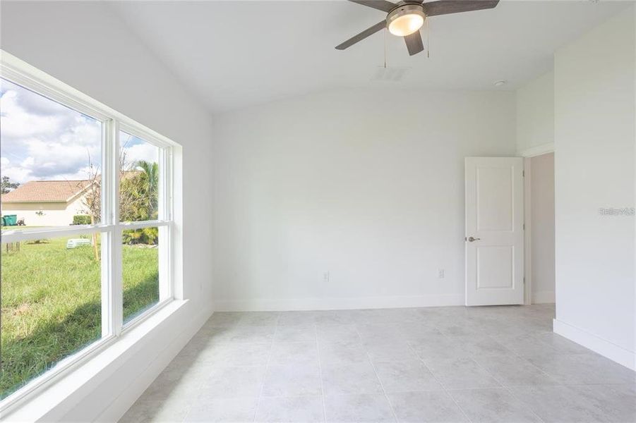Spacious, unfurnished interior of a new home in , Port Charlotte (Image 24).