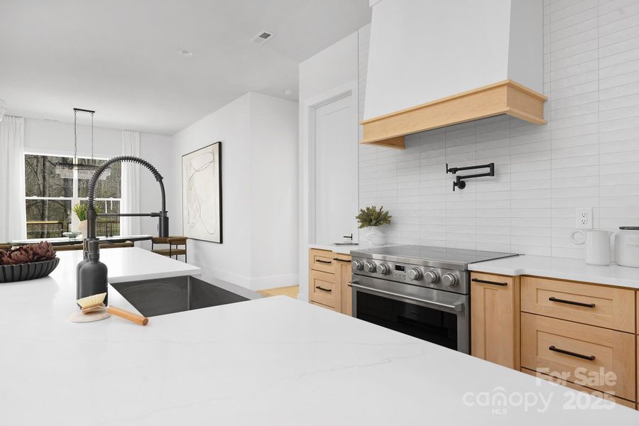 Previous build by NewGen Builders, LLC showing planned design and finishes