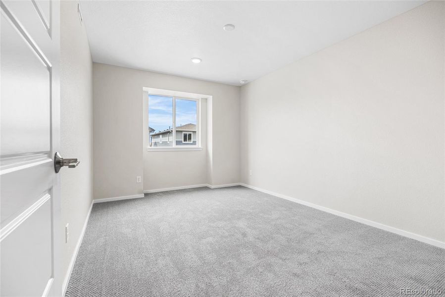 Spacious, unfurnished interior of a new home in Barefoot Village, Firestone (Image 17).