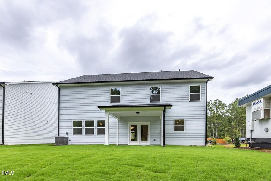 Front exterior of a new home in Sage on North Main, Wake Forest, NC, highlighting curb appeal (Image 2).