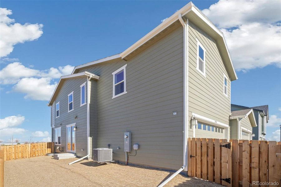 Exterior details and patio area of a home in Turnberry, Commerce City (Image 3).