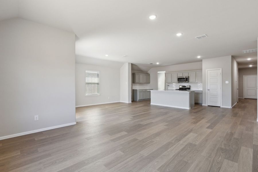 Living Room in the Harrison home plan by Trophy Signature Homes – REPRESENTATIVE PHOTO