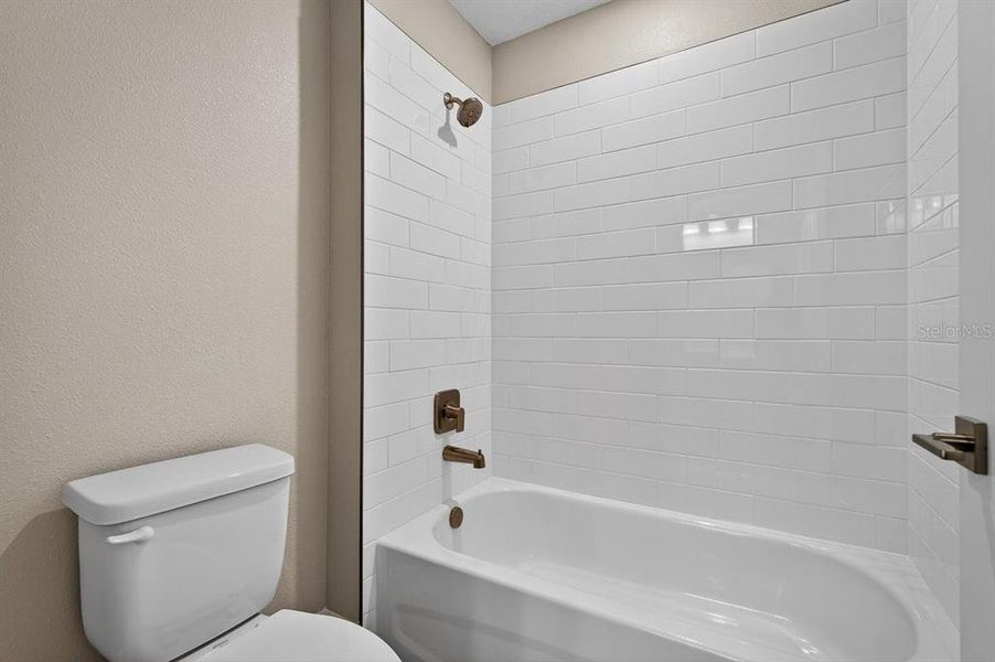 Furnished interior view inside a new home in Gray Hawk at Hole Two, Daytona Beach (Image 13).