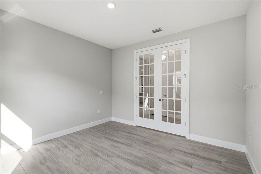 Spacious, unfurnished interior of a new home in Esplanade at Westview, Kissimmee (Image 27).