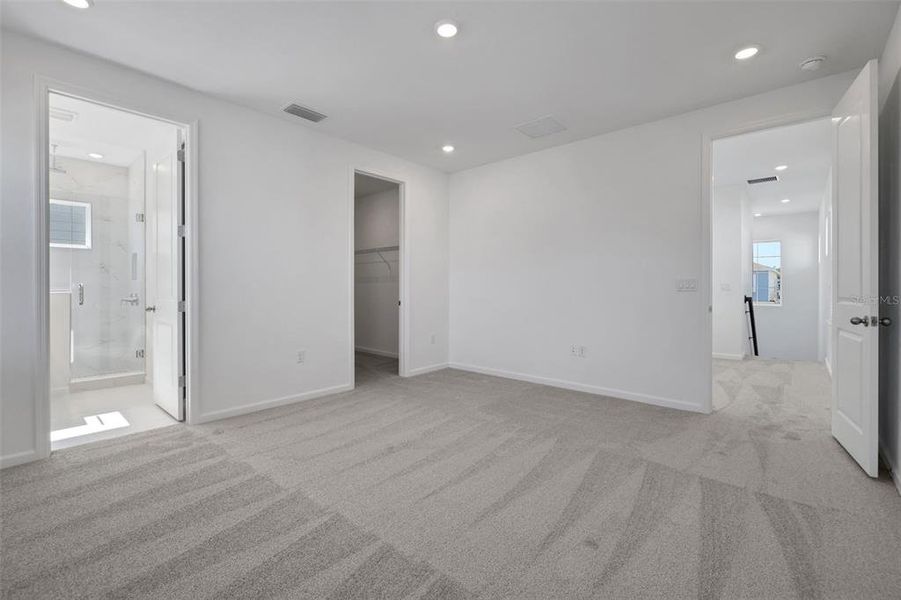 Spacious, unfurnished interior of a new home in Serenade at Ovation, Winter Garden (Image 20).