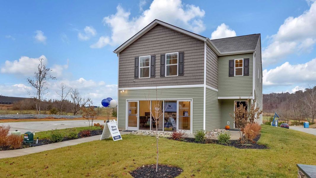 Representative exterior photo of a completed home built from the Elston by D.R. Horton in The Hideaway at Fox Meadows, Bluff City, TN (Image 1).