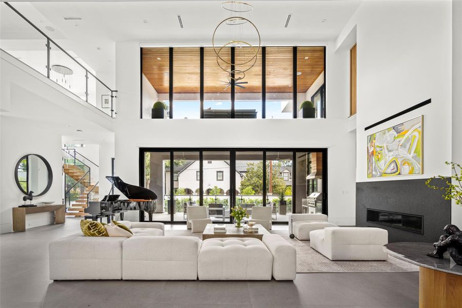 Family room overlooks the backyard and summer kitchen. Family room overlooks the backyard and summer kitchen.