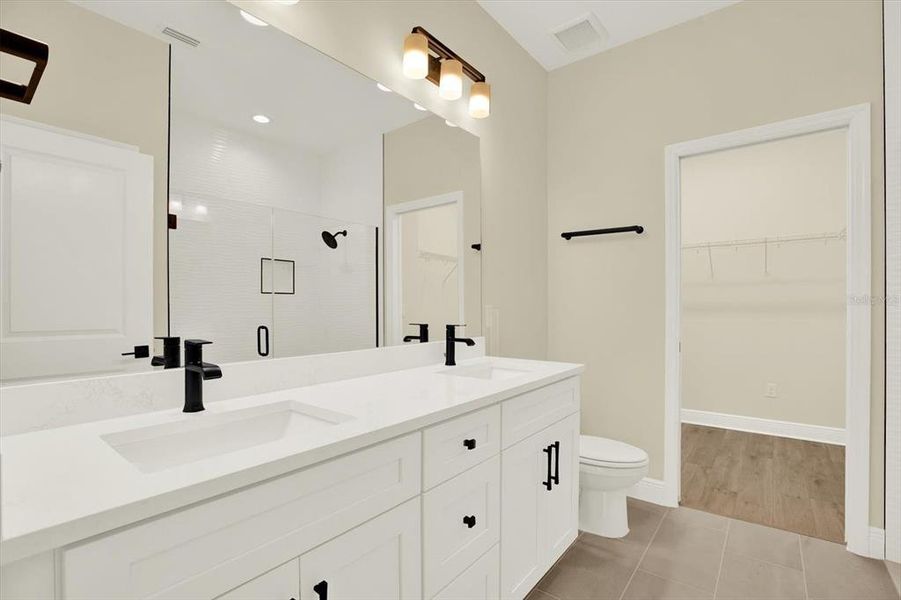 Furnished interior view inside a new home in The Towns At Long Bayou, Seminole (Image 7).