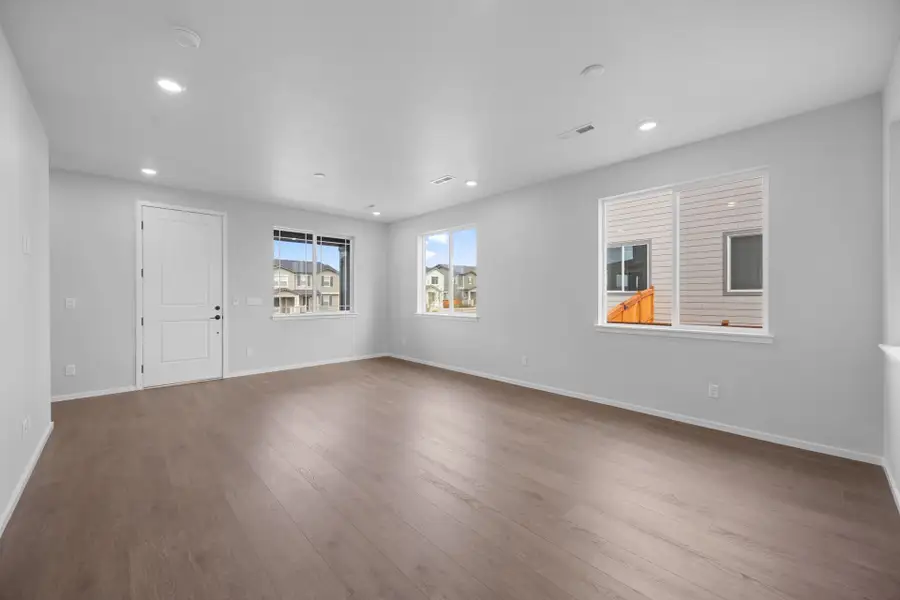 Spacious, unfurnished interior of a new home in Sky Ranch, Watkins (Image 21).