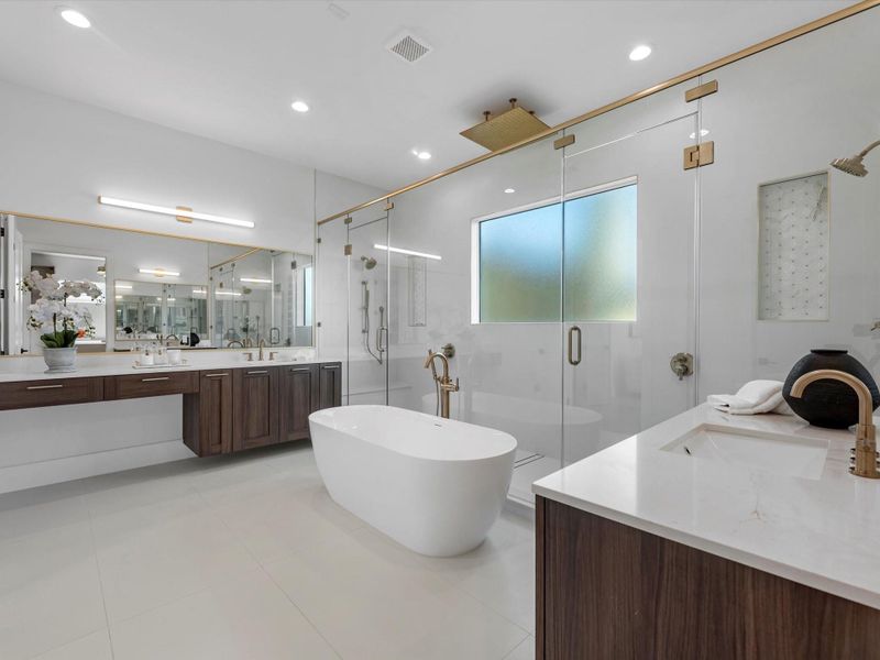 Just WOW! Quartz countertops and the superior quality of the fixtures is all around.