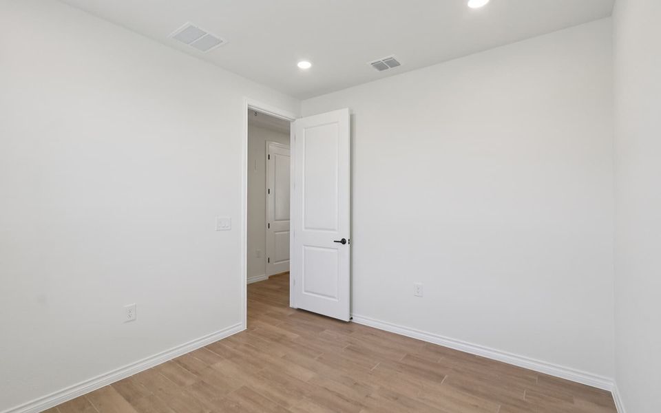 Spacious, unfurnished interior of a new home in Cottage at Kissing Tree, San Marcos (Image 13). Spacious, unfurnished interior of a new home in Cottage at Kissing Tree, San Marcos (Image 13).