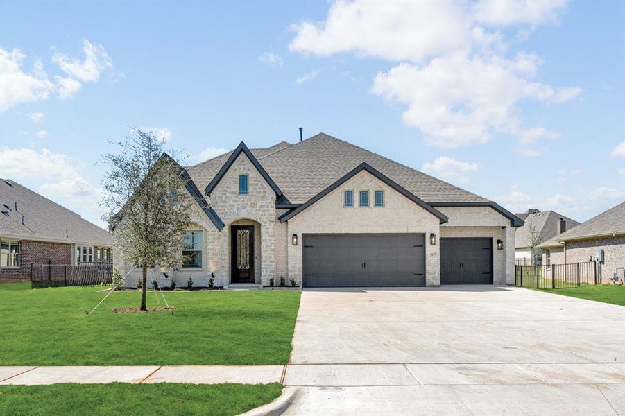 Front exterior of a new home in Abe's Landing, Granbury, TX, highlighting curb appeal (Image 2).