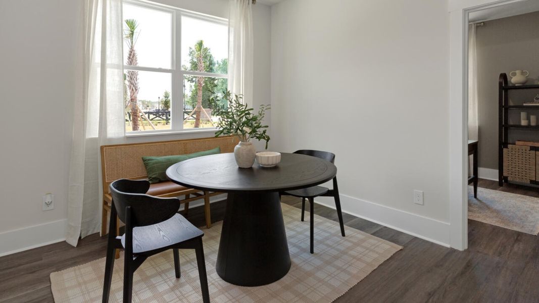 Representative furnished interior of a home built from the TUSCAN II by D.R. Horton in Indigo Preserve Townhomes, Leland (Image 9).