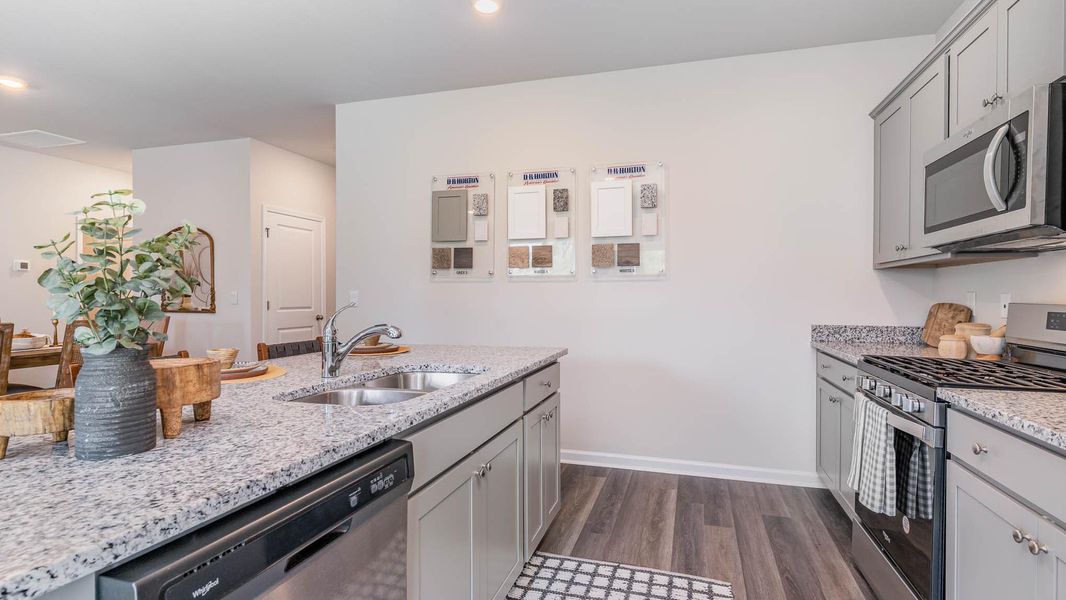 Representative furnished interior of a home built from the KERRY by D.R. Horton in Sutton Farm, Loris (Image 8).