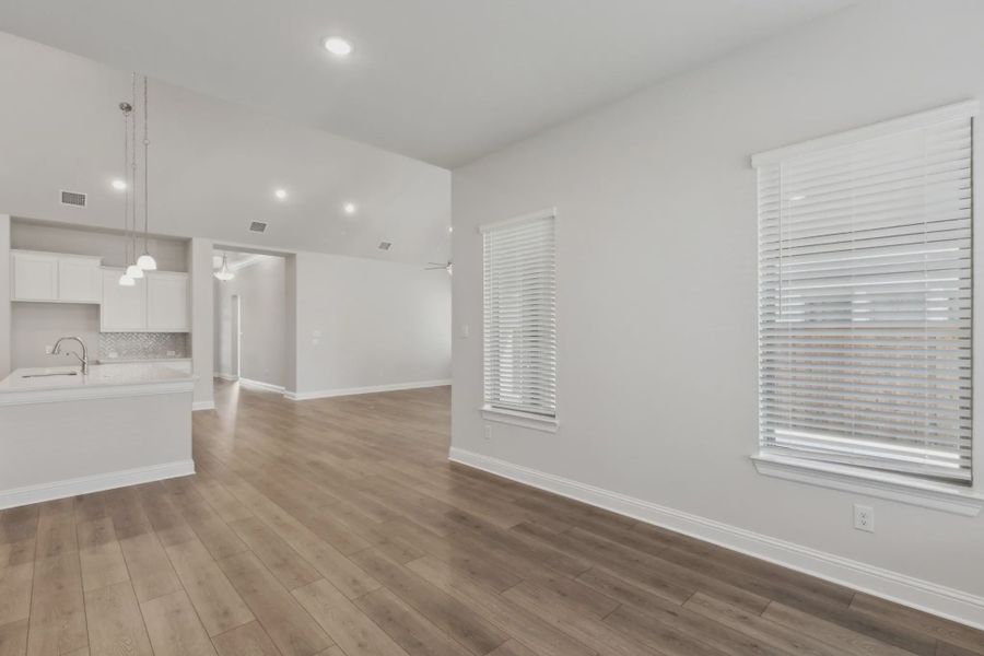 Representative unfurnished interior of a home built from the Andover by Chesmar Homes in Karis, Crowley (Image 9).