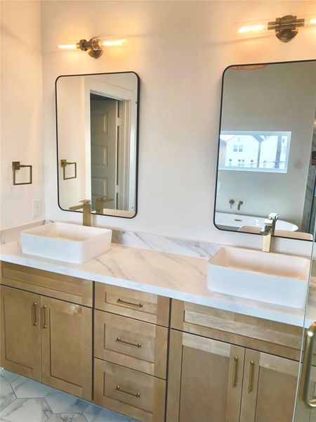 Example of the buyer chosen hardware and mirrors. Buyers may choose hardware and mirror with seller credit and builder to install.