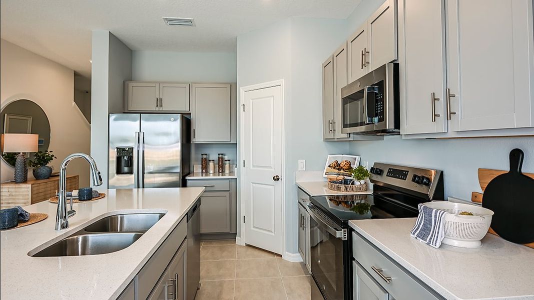 Representative furnished interior of a home built from the Jasmine by Taylor Morrison in Waterstone Townhomes, Groveland (Image 7). Representative furnished interior of a home built from the Jasmine by Taylor Morrison in Waterstone Townhomes, Groveland (Image 7).