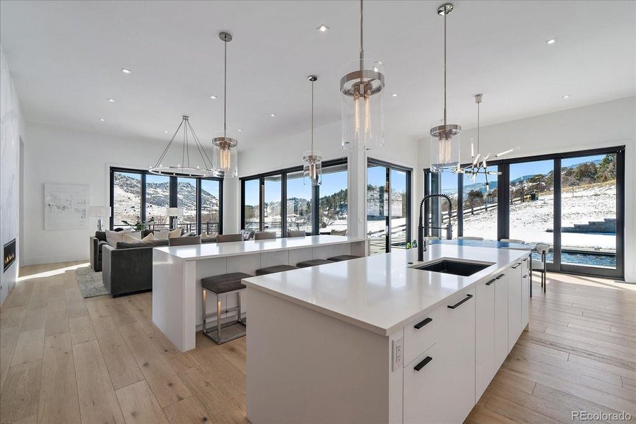 Two Islands - Quartz Countertops, acrylic custom cabinets