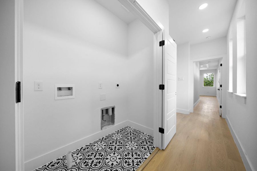 Tiled washer, dryer area. Tiled washer, dryer area.