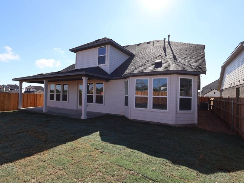 Exterior details and patio area of a home in Edgewood, Leander (Image 1). Exterior details and patio area of a home in Edgewood, Leander (Image 1).