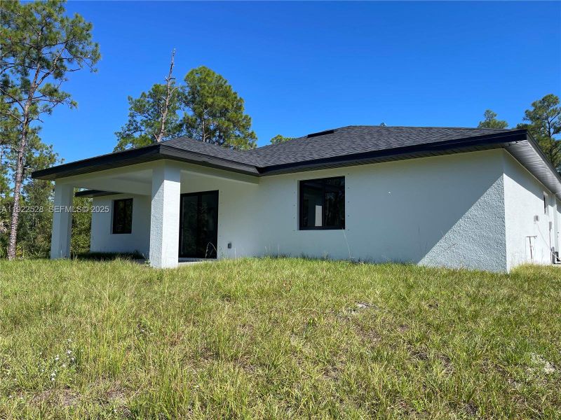 Exterior details and patio area of a home in , Lehigh Acres (Image 23). Exterior details and patio area of a home in , Lehigh Acres (Image 23).