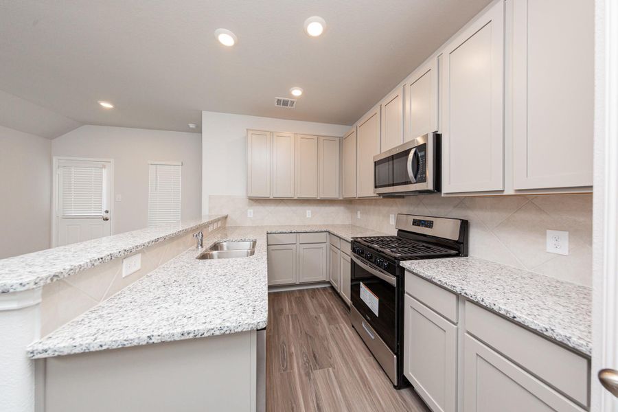 Furnished interior view inside a new home in River's Edge, Conroe (Image 5).