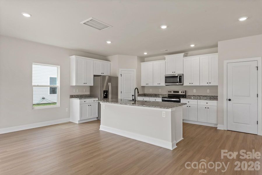 Furnished interior view inside a new home in Stagecoach Station, Gastonia (Image 7).