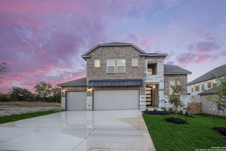 Front exterior of a new home in Buffalo Crossing – New Phase Now Preselling, Cibolo, TX, highlighting curb appeal (Image 1).