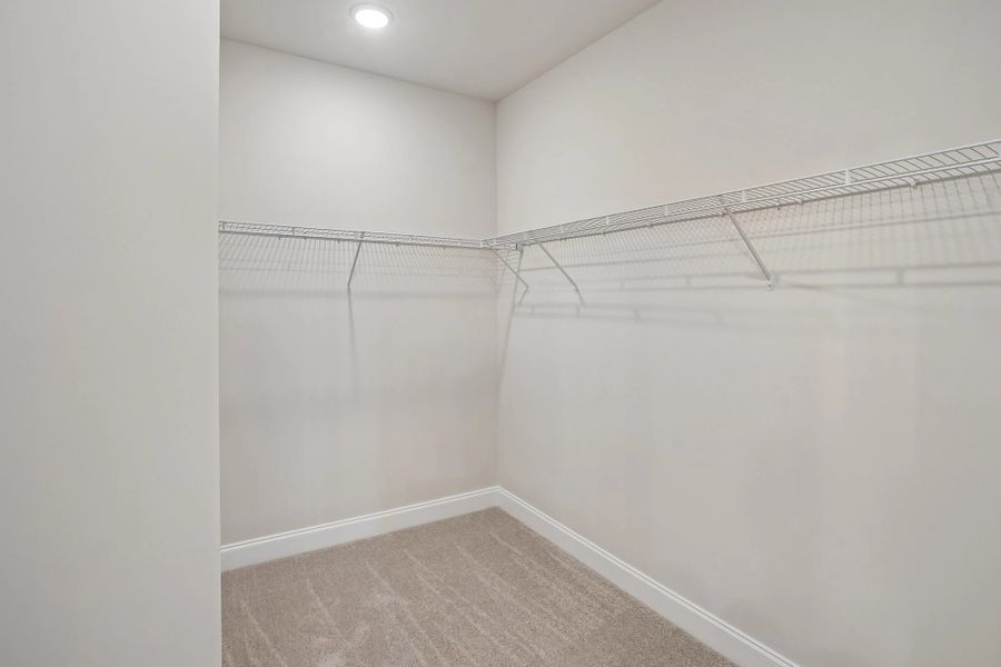 Primary Walk-in Closet Primary Walk-in Closet