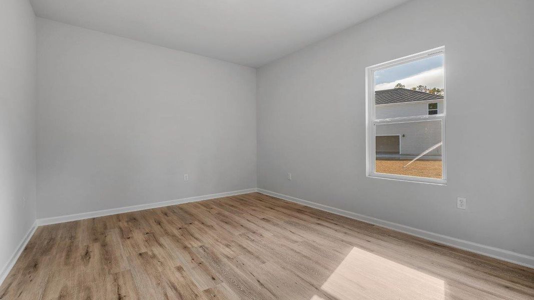 Spacious, unfurnished interior of a new home in Greystone, Crawfordville (Image 30).