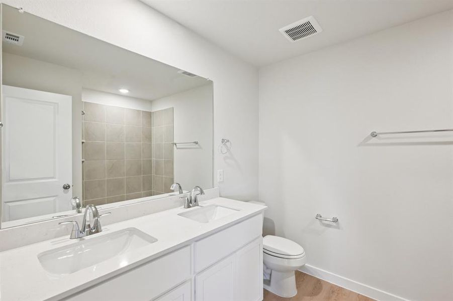 Furnished interior view inside a new home in Summerwood Estates, Red Oak (Image 11). Furnished interior view inside a new home in Summerwood Estates, Red Oak (Image 11).