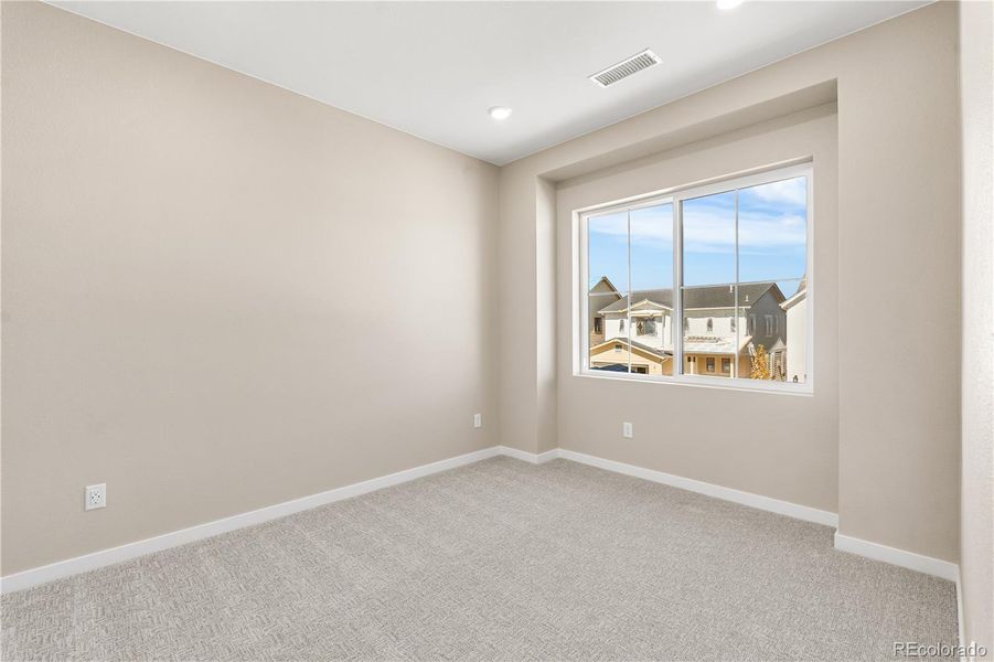 Spacious, unfurnished interior of a new home in Harmony at Solstice, Littleton (Image 24).