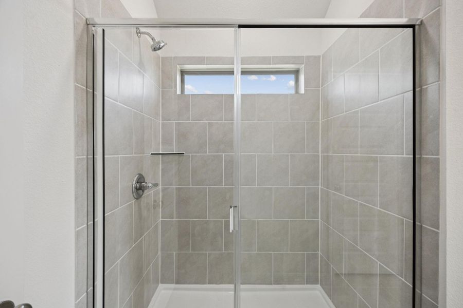 Bathroom featuring a stall shower