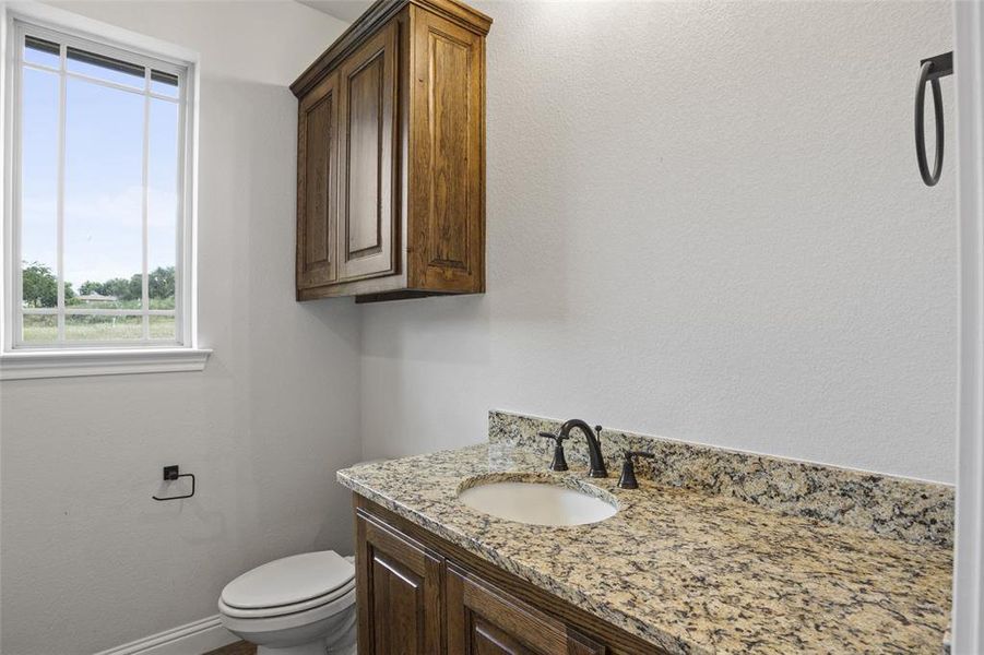 Bathroom with vanity and toilet