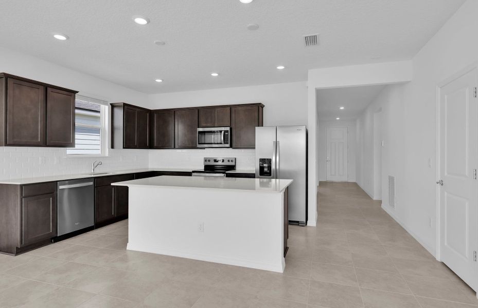 Furnished interior view inside a new home in Hyland Trail, Green Cove Springs (Image 3).