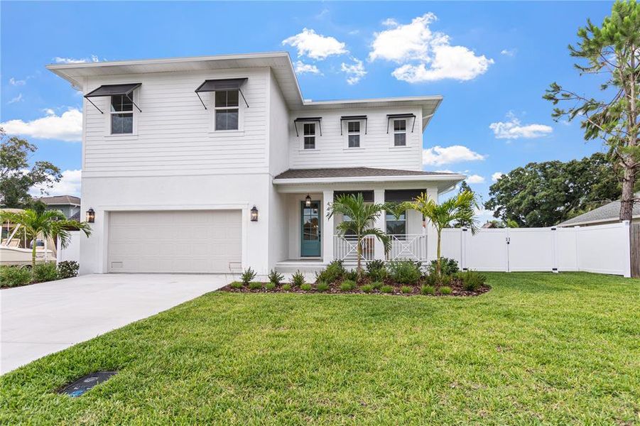 Front exterior of a new home in , Tampa, FL, highlighting curb appeal (Image 2). Front exterior of a new home in , Tampa, FL, highlighting curb appeal (Image 2).