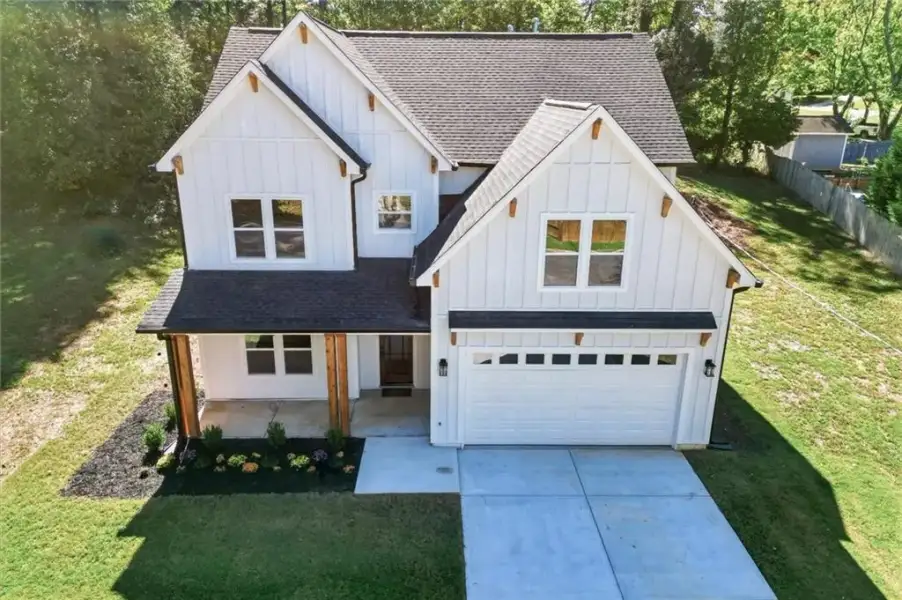 Front exterior of a new home in , Austell, GA, highlighting curb appeal (Image 27). Front exterior of a new home in , Austell, GA, highlighting curb appeal (Image 27).